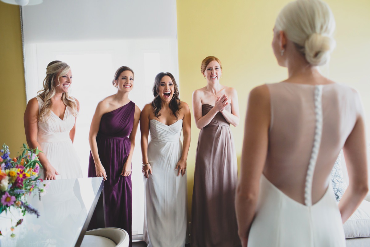 bridesmaids-see-bride-dressed