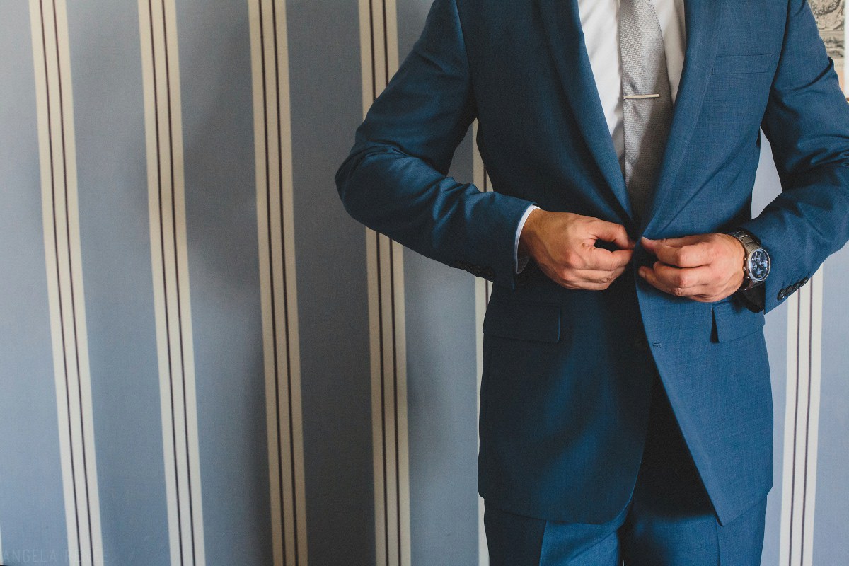 paris-groom-putting-on-suit