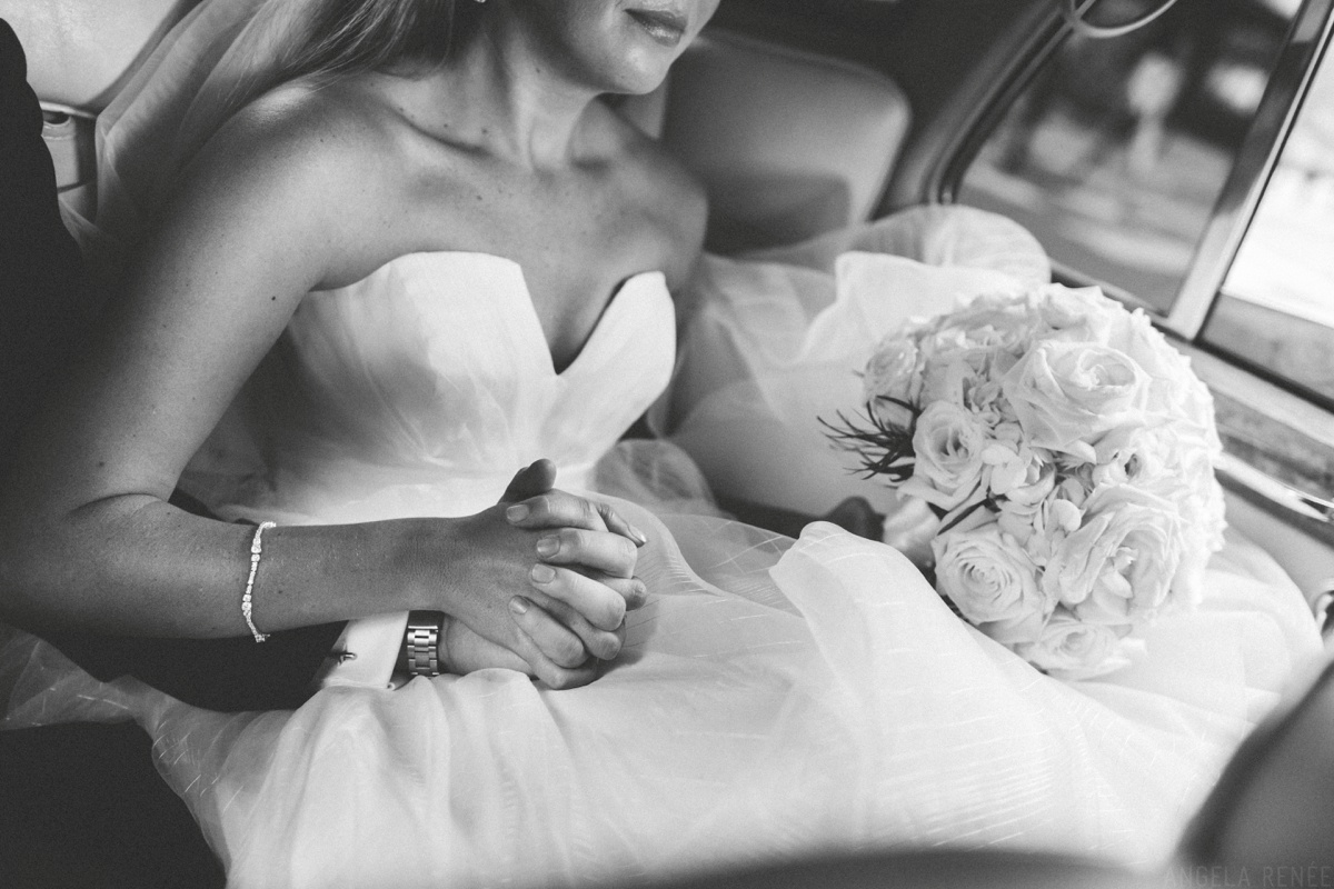 bride and groom in car