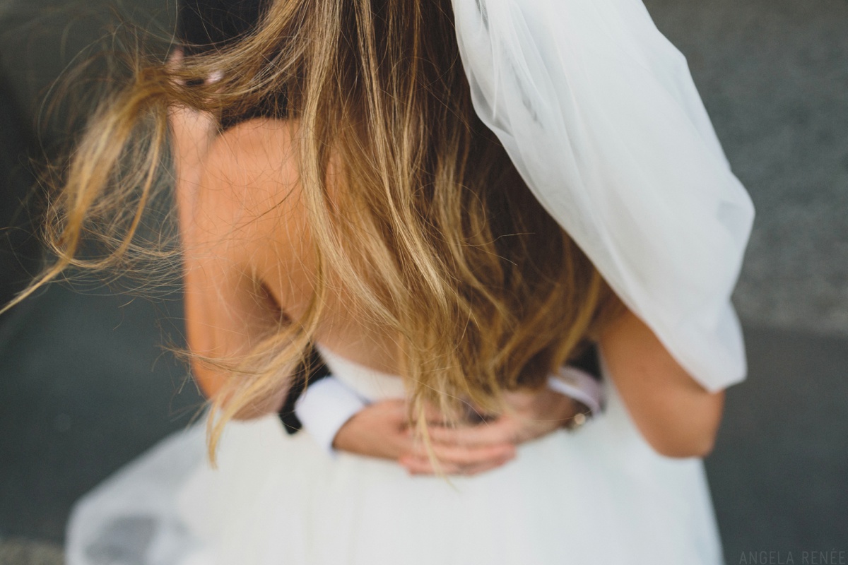 artistic wedding day photo of brides hair