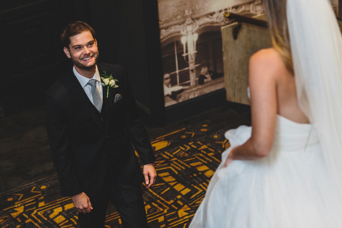 groom seeing bride for first look