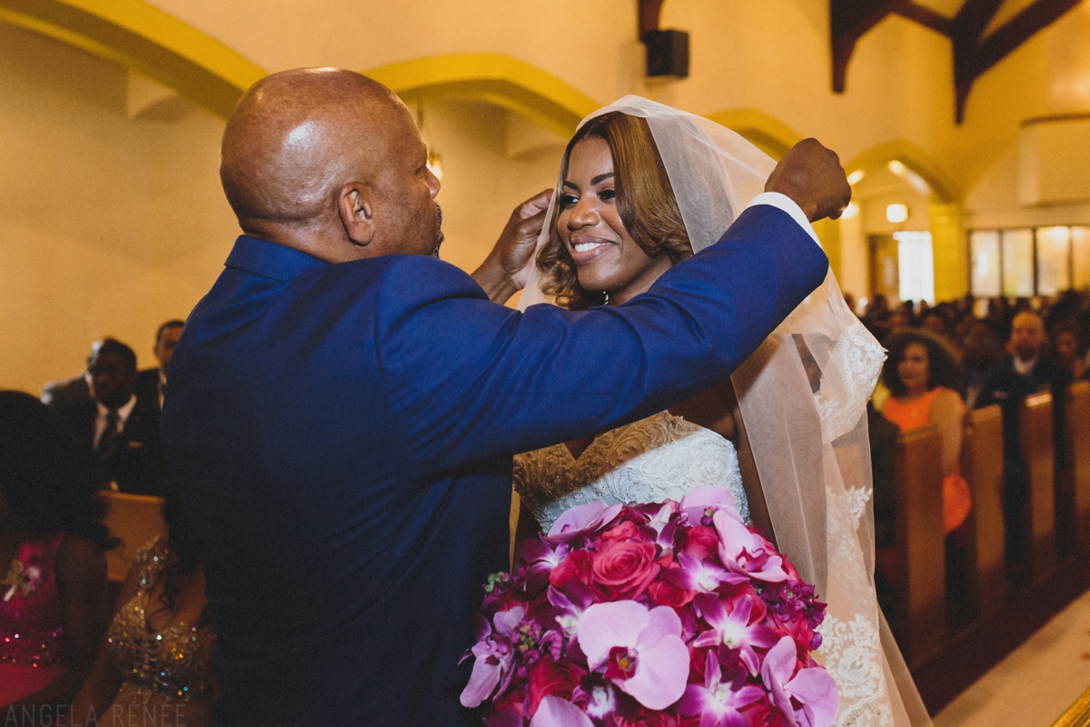 father giving away bride