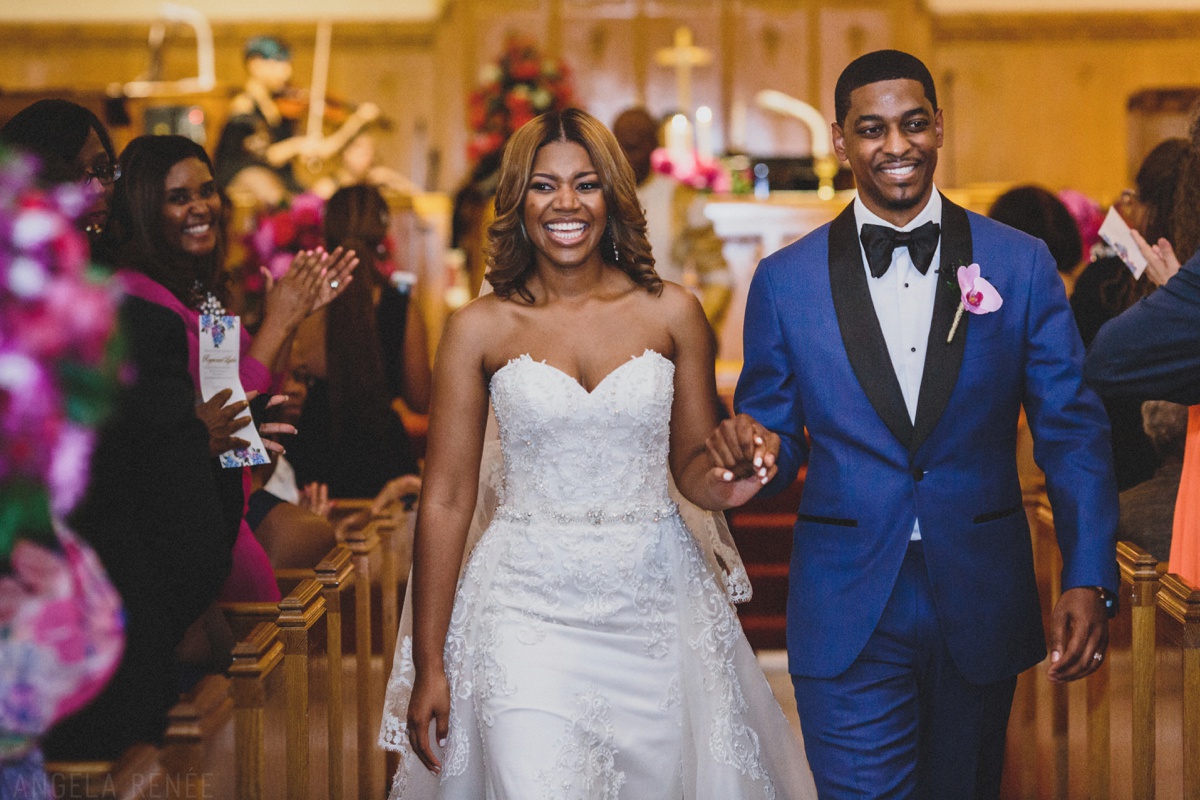 bride and groom walking down aisle