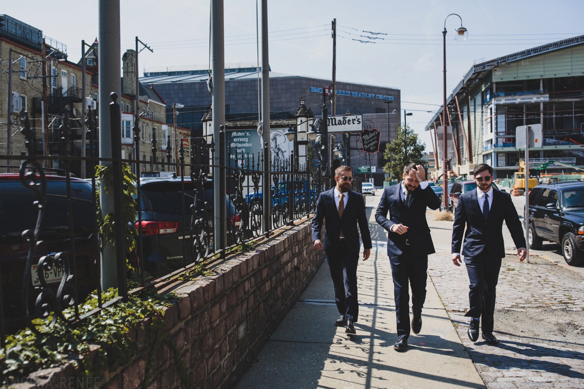 groom walking to first look