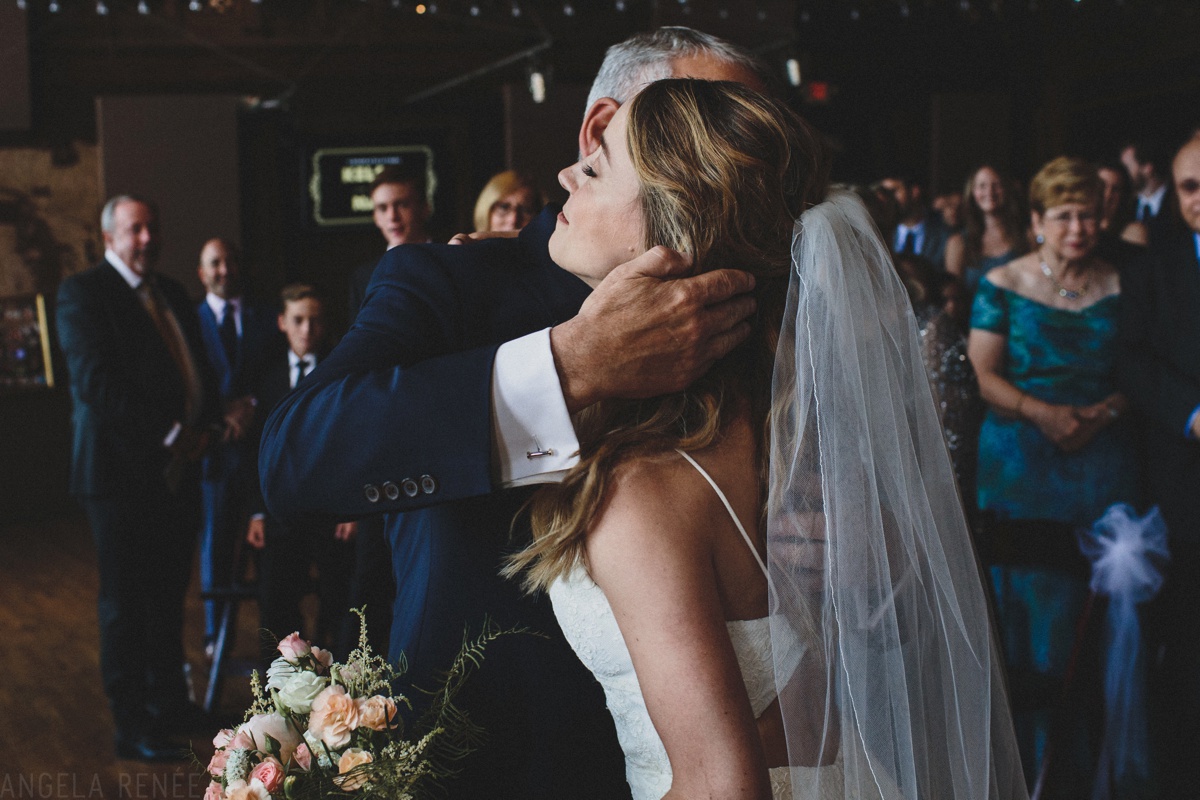 bride hugging father