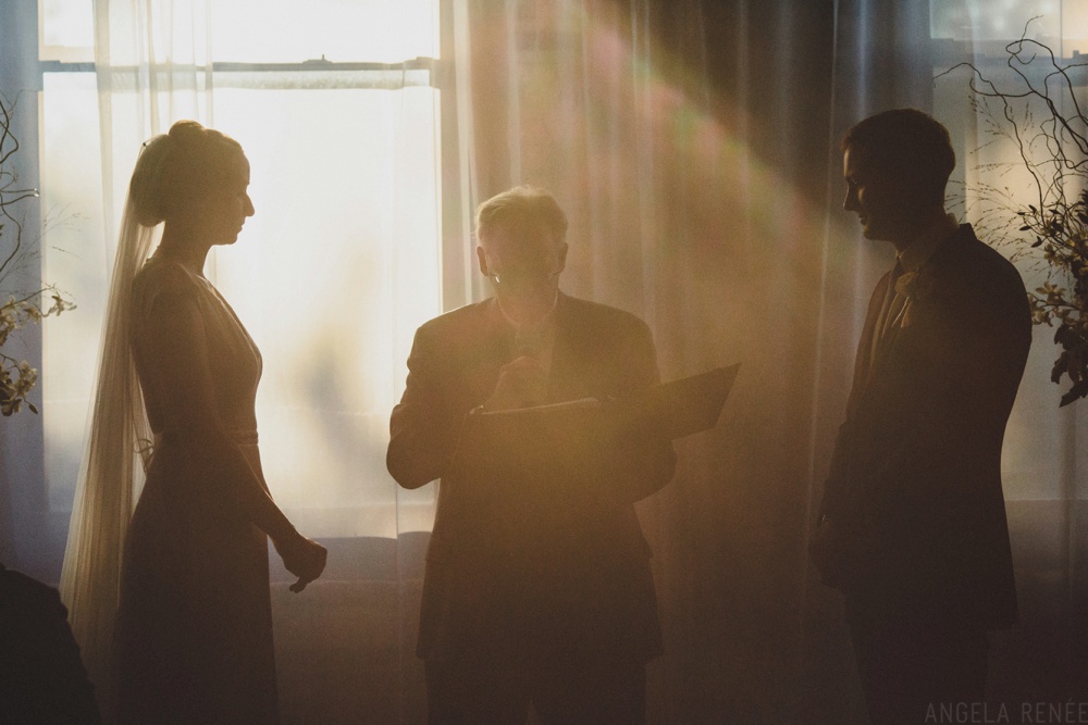 backlit-windows-wedding-ceremony