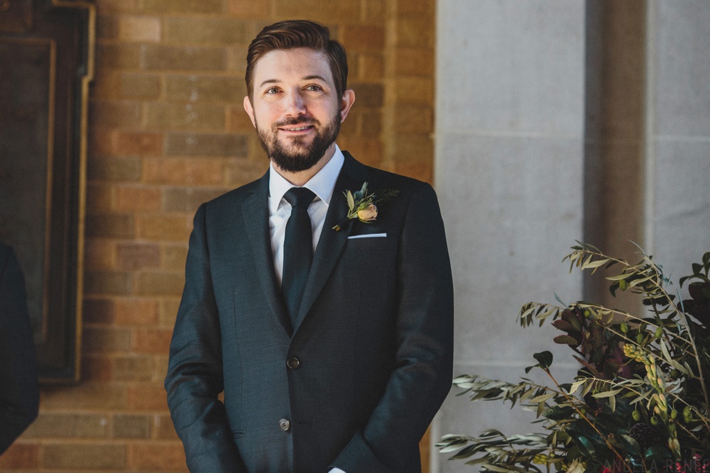 groom-looking-at-bride