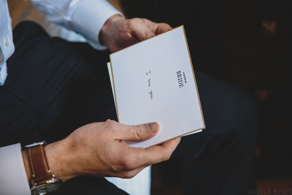 groom-reading-letter-from-bride