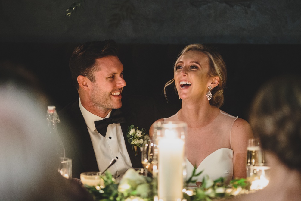 candid-laughing-wedding-couple